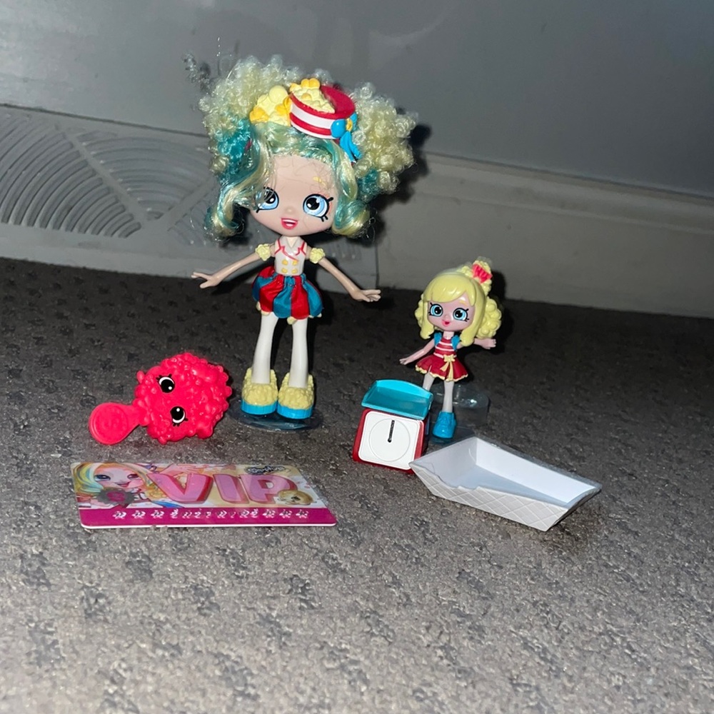 Popcorn Shopkin Doll. Comes with brush, VIP card weight, holder, mini doll.